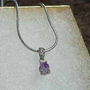 Beautiful amethyst necklace in sterling silver with cz stones in pendant!